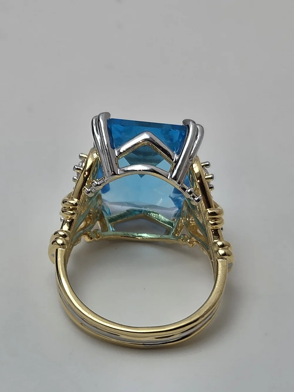 Bright Blue Cushion-Cut Ring in Gold Tone